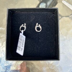 10k White gold mother and child stud earrings.